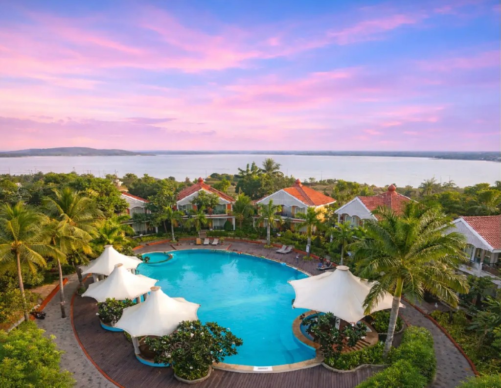 Swosti Chilika Resort pool and villas overlooking Chilika Lake